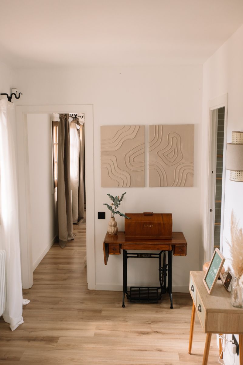 Guest room with vintage sewing-machine detail