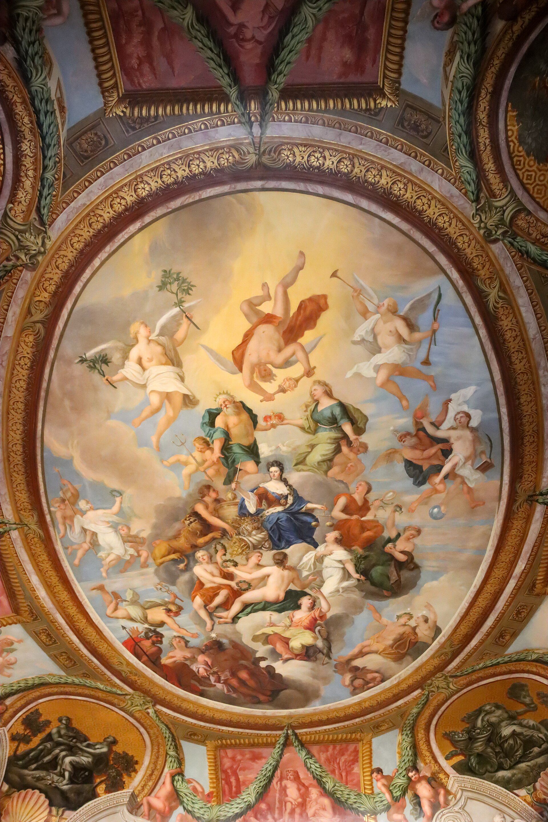 A state-apartment ceiling, an oval mythological fresco framed in gilded plaster