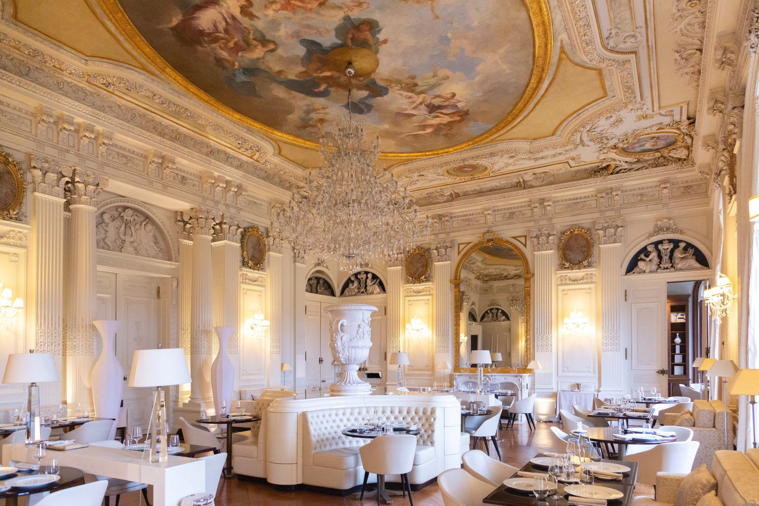 The Salon Blanc beneath a painted ceiling
