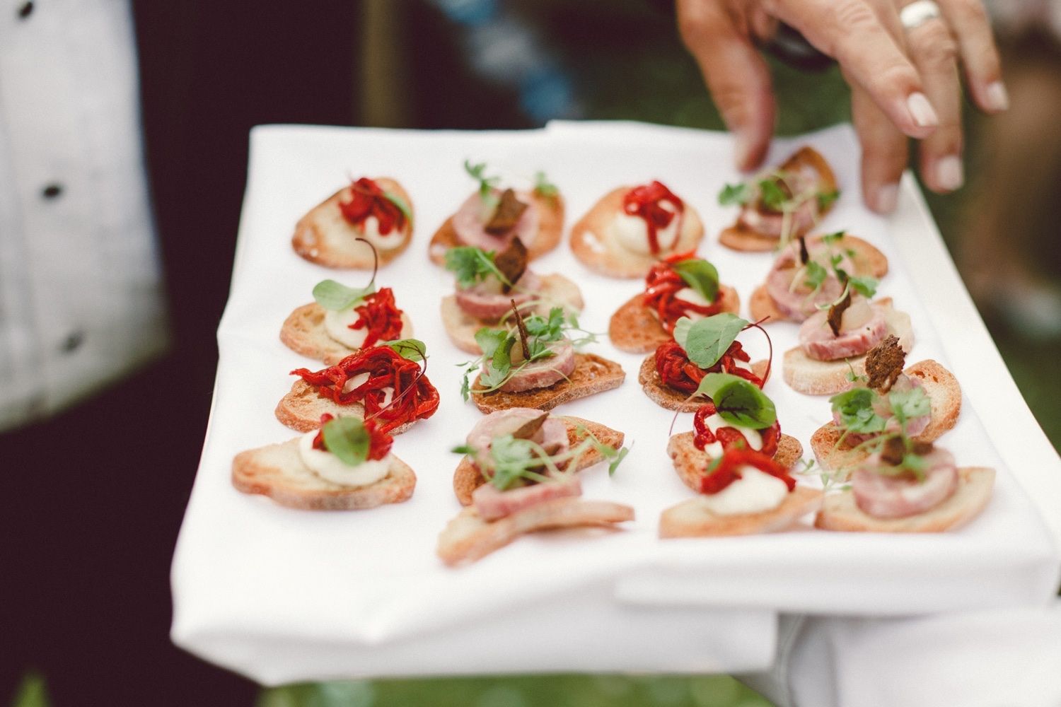 Canapes carried on a tray during a drinks reception