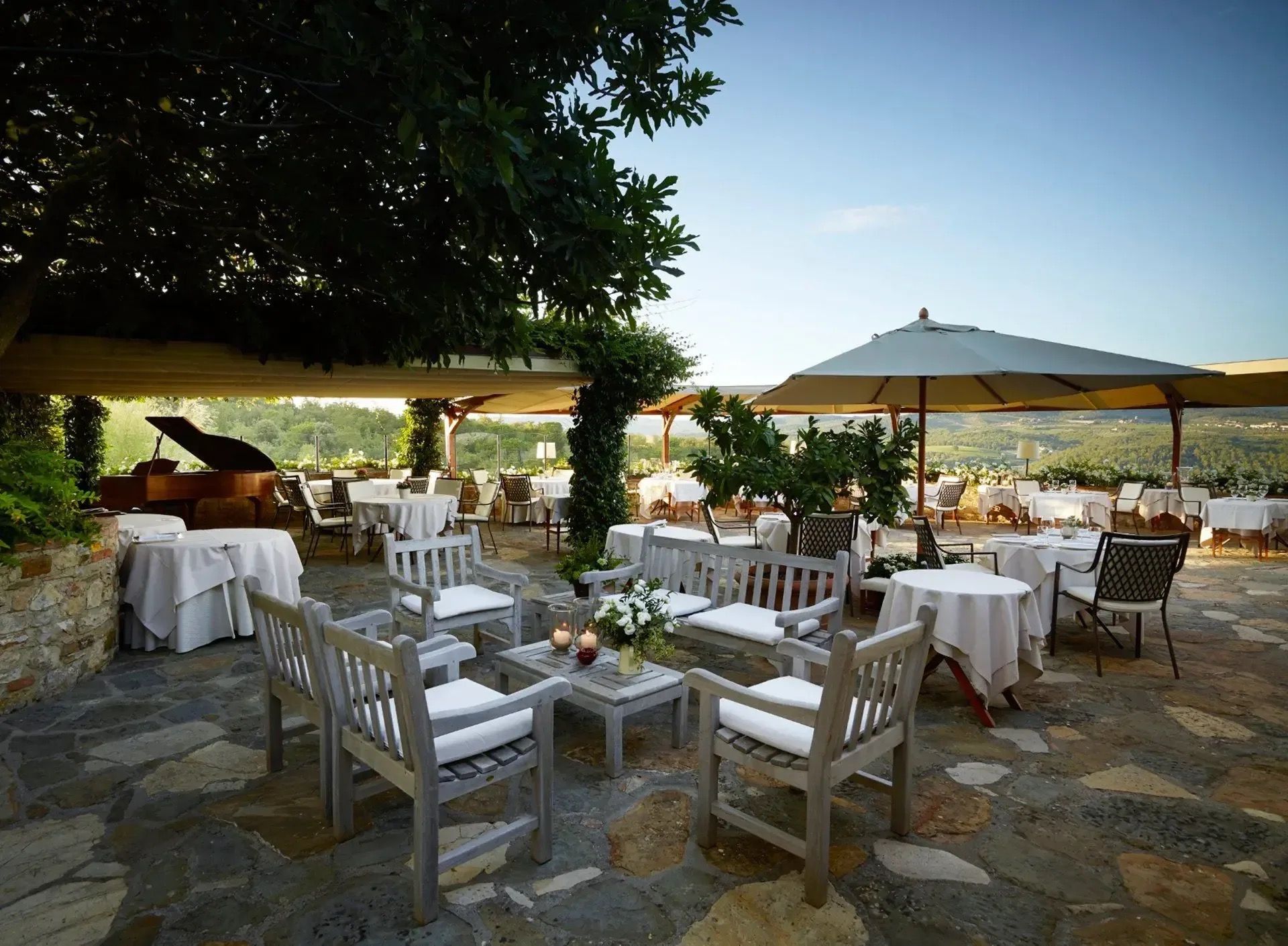 A wedding reception on a lawn in the Chianti hills