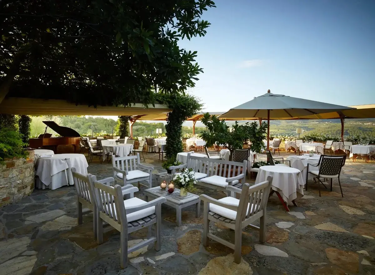 A wedding reception on a lawn in the Chianti hills