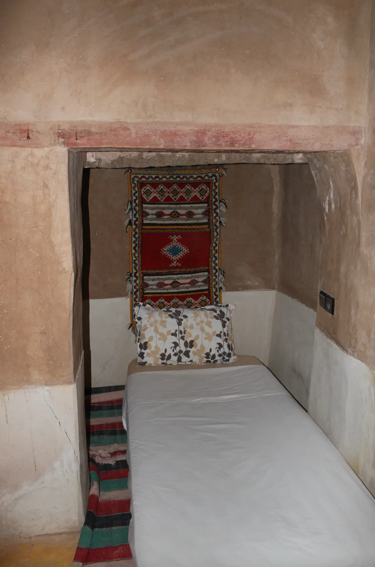 A room within the kasbah walls, in earth and rug, Kasbah des Caïds, Agdz, Morocco