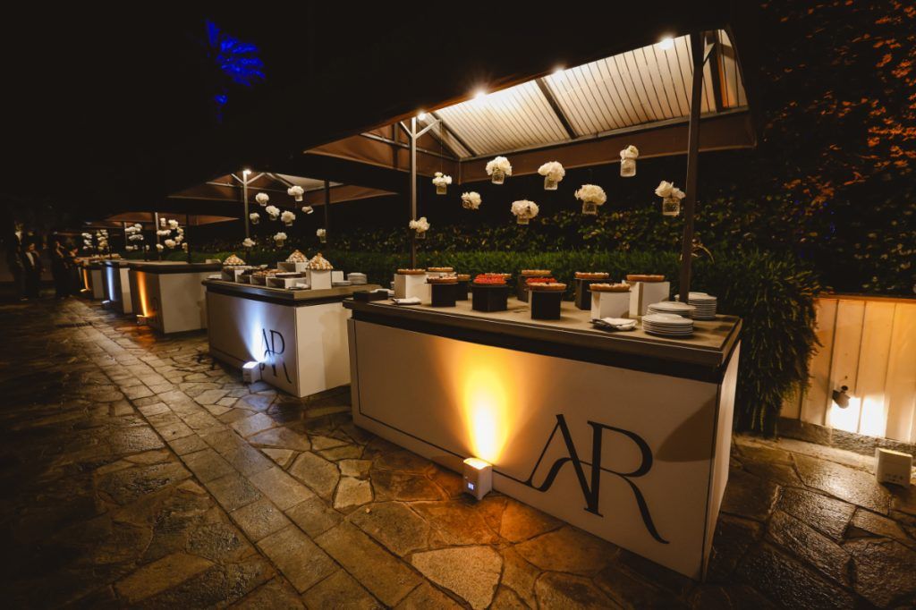 The bar, monogrammed, lit from below