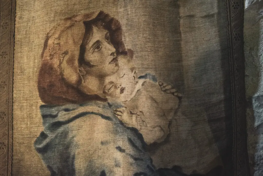 The abbey's Madonna and Child fresco on old plaster