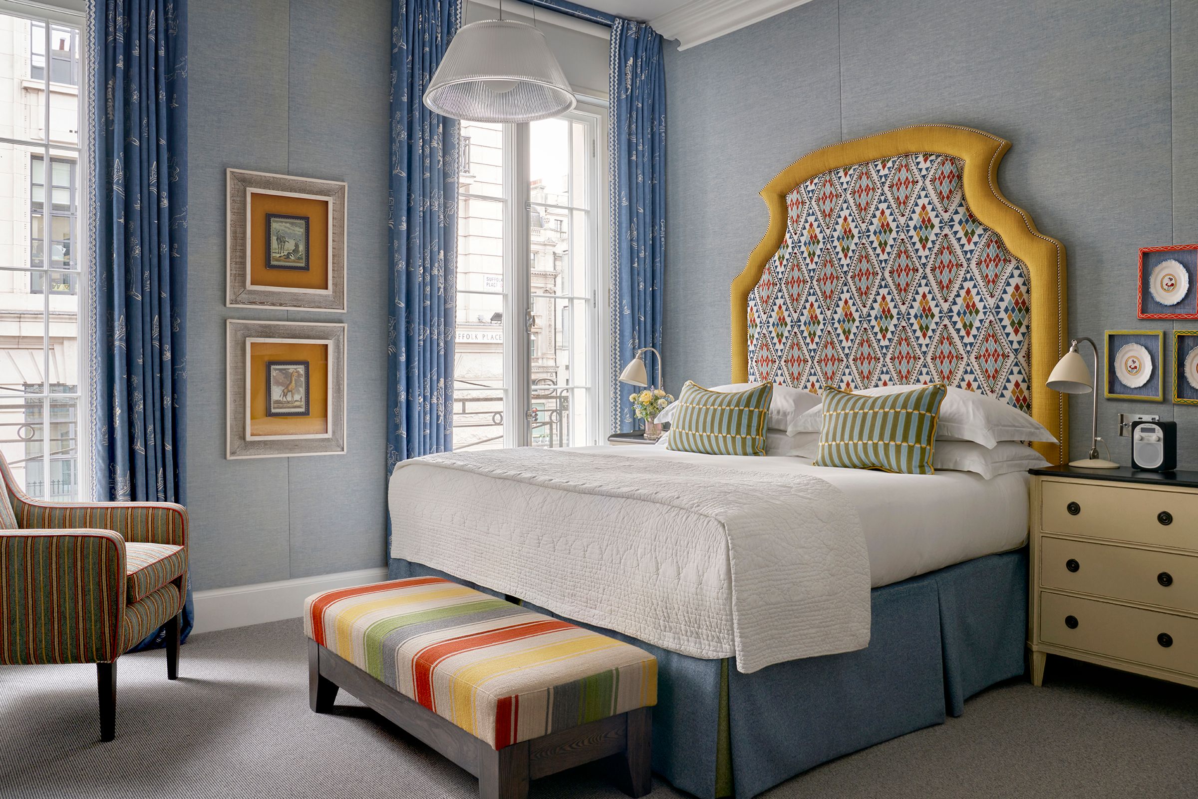 A Deluxe Room, in bold colour and pattern