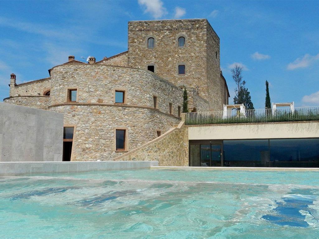 The thermal spa pool at Castello di Velona below the 11th-century fortress, Val d'Orcia, Tuscany