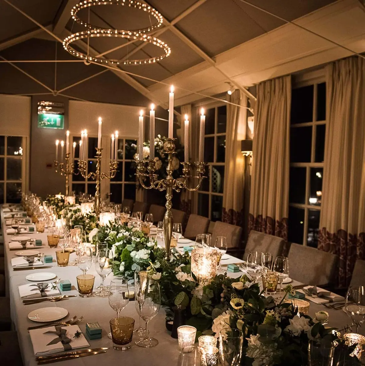 The Summer House dressed for a wedding breakfast, a long table under a fairy-lit canopy, Chewton Glen Hotel & Spa, New Milton, England