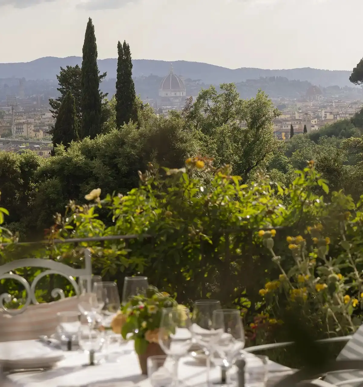 The gardens at golden hour, stone balustrade above Florence, Il Salviatino
