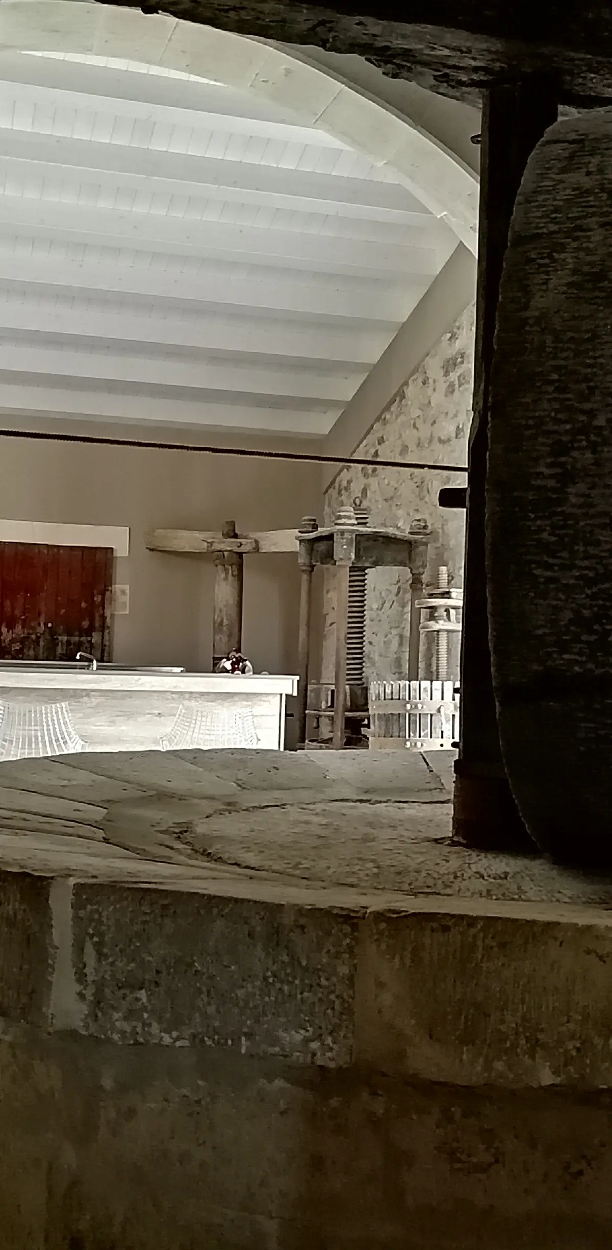 The wine bar, built around an ancient stone millstone