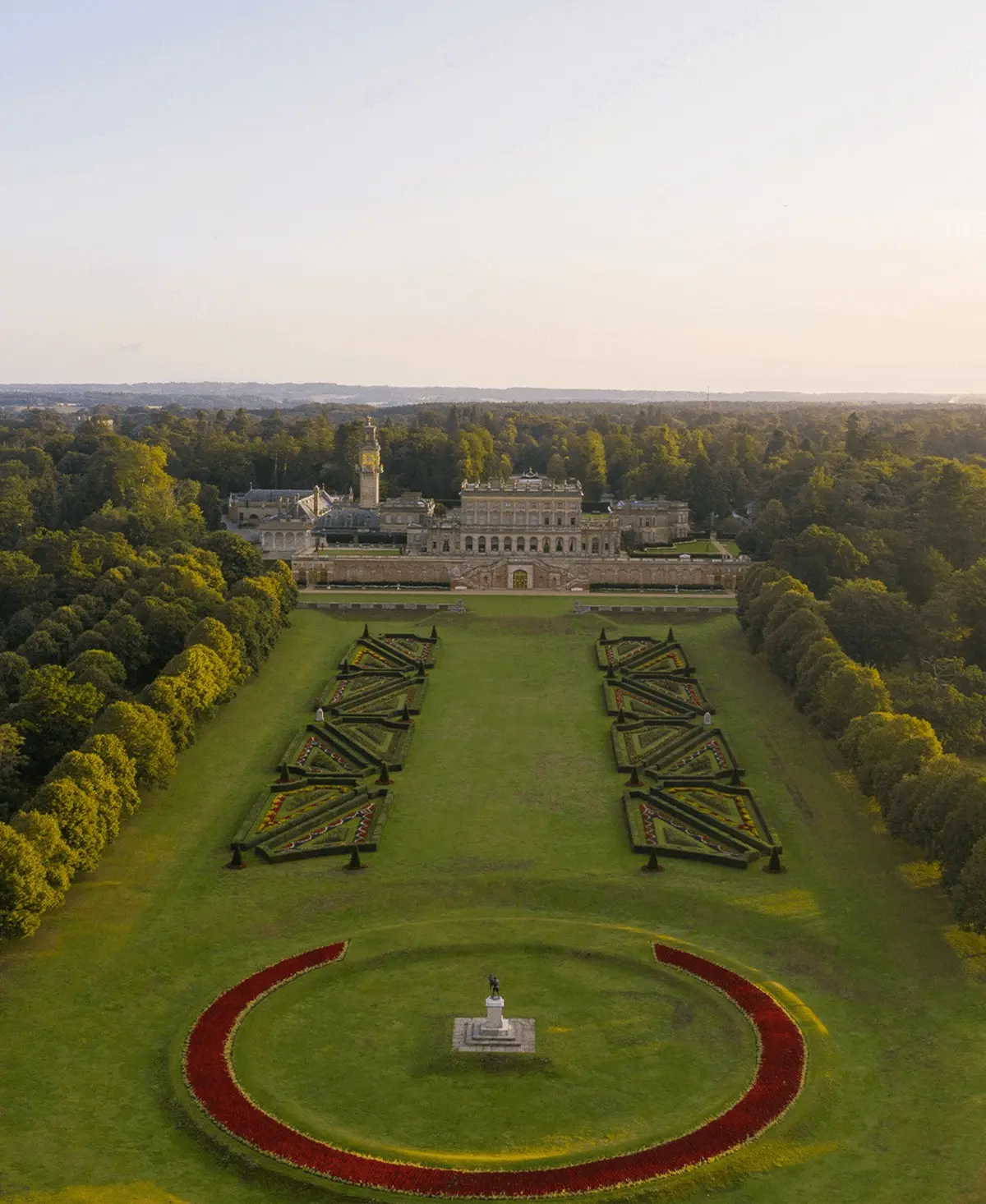 Aerial of the Italianate parterre gardens with the house above, Cliveden House & Pavilion Spa, Taplow, England