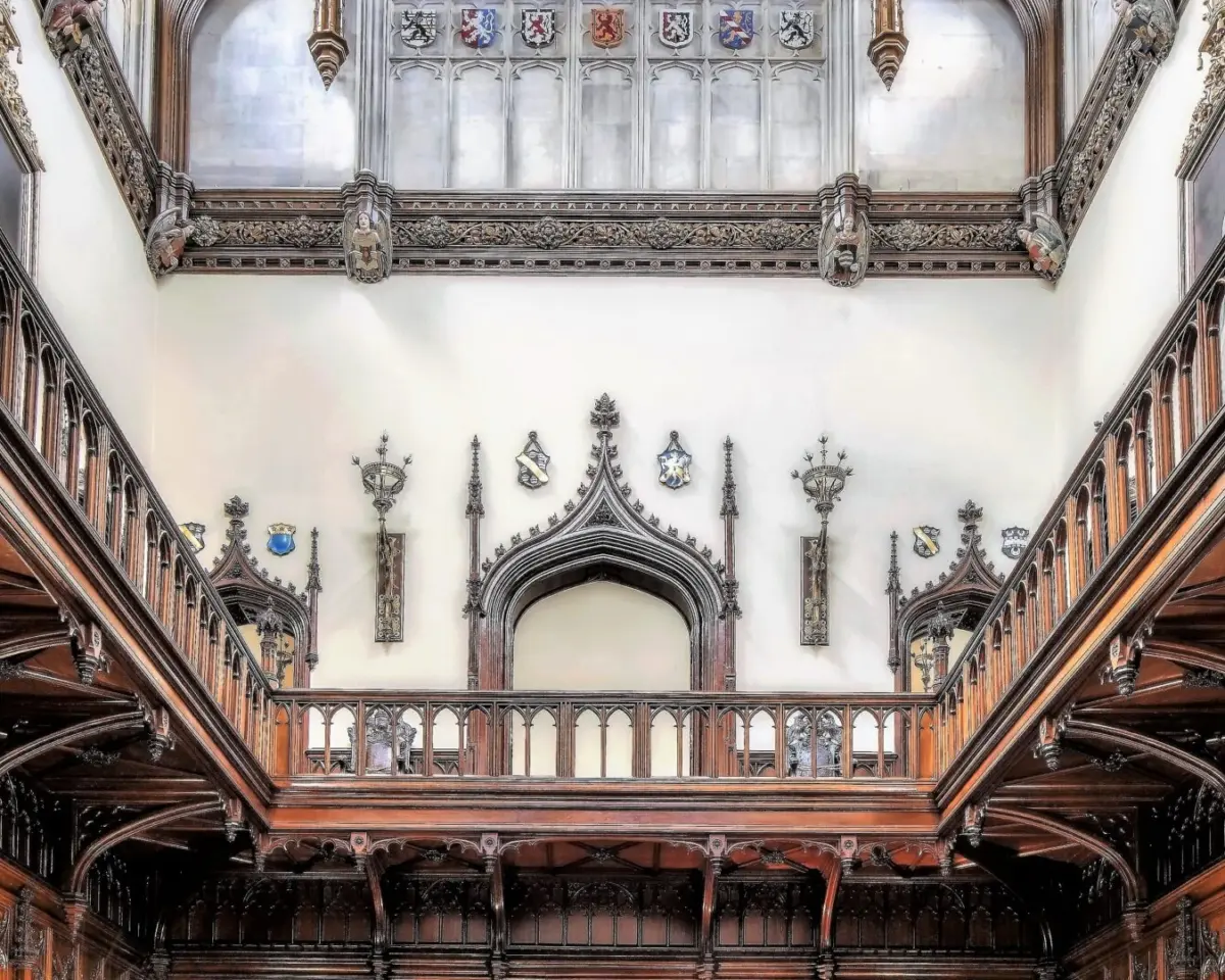 The Great Hall, carved Gothic timber and a soaring beamed ceiling