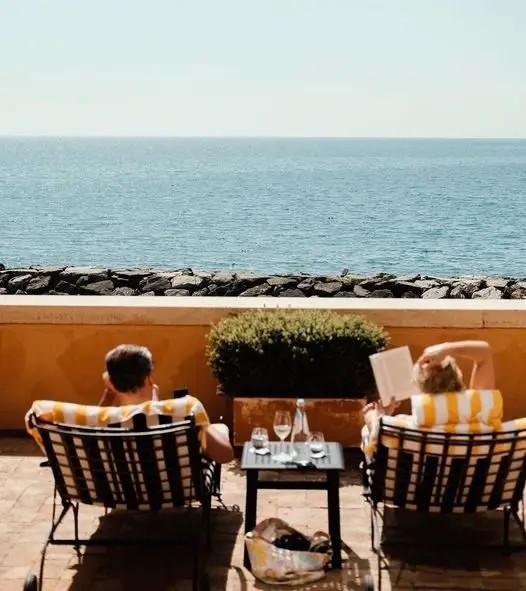 A Ceremony Above the Sea. A Banquet Among Tapestries and Antiquities.