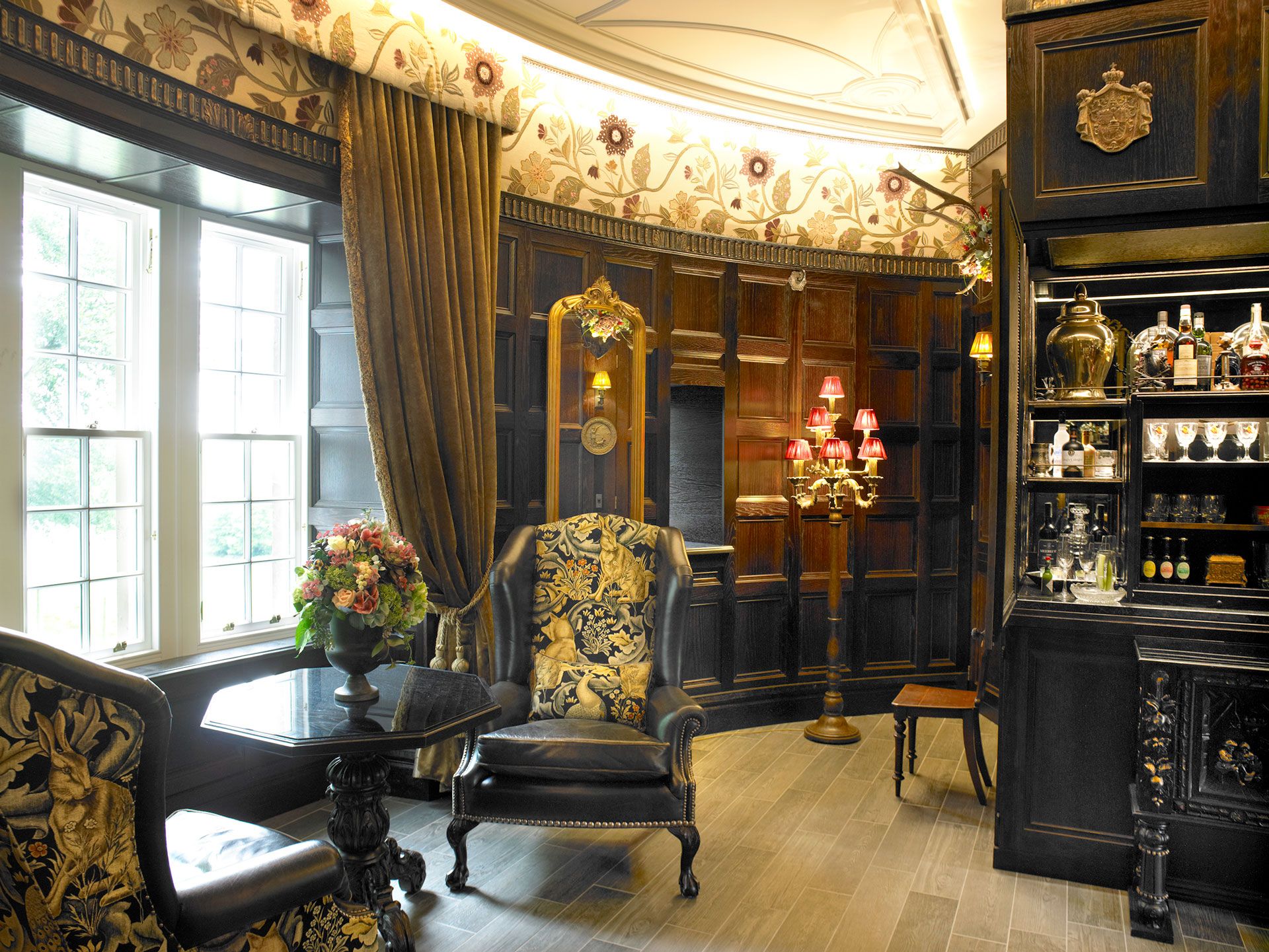 The gatehouse drawing room dressed with antiques