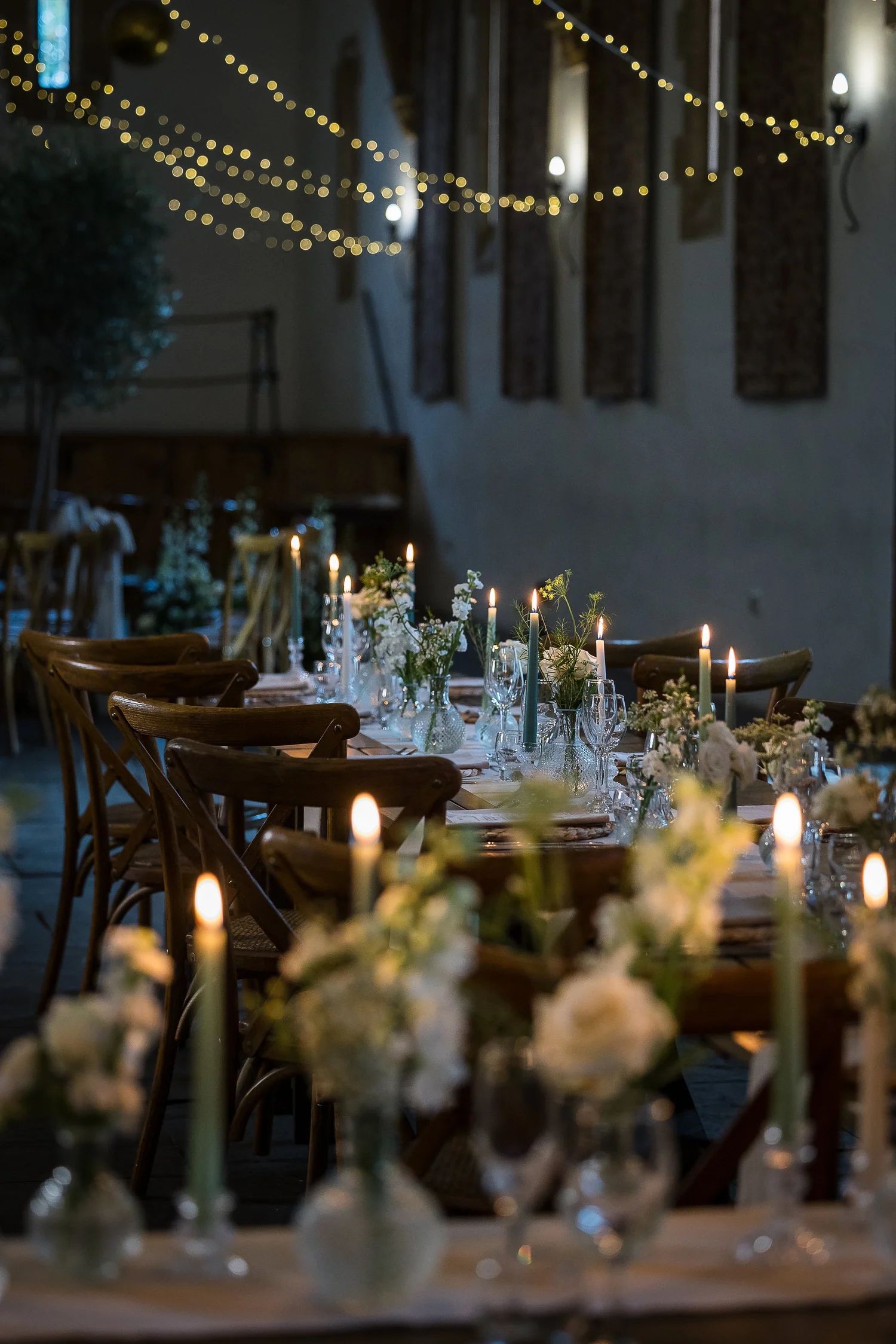 A candlelit evening reception under fairy lights