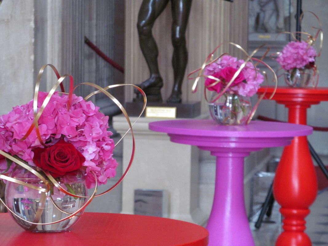 Pink hydrangea arrangements on poseur tables