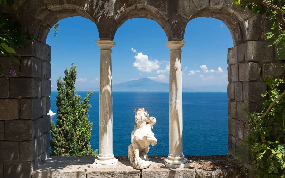 A stone loggia above the bay, Vesuvius on the horizon, Amalfi Coast