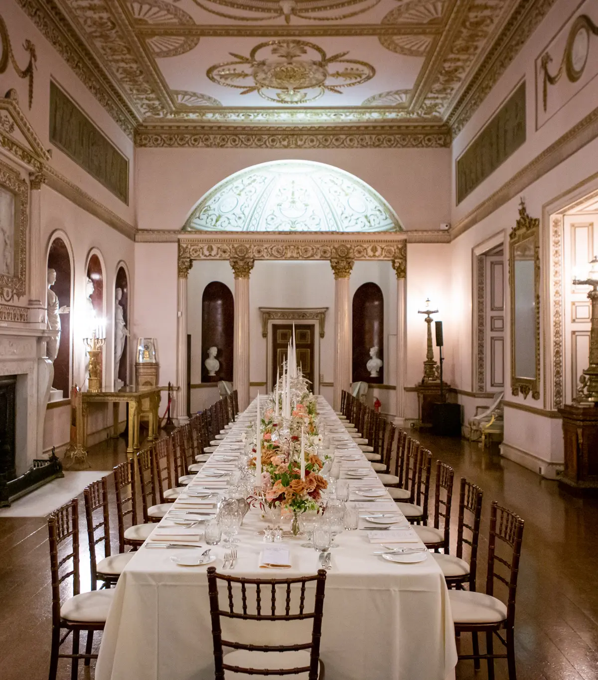The State Dining Room laid for dinner, Corinthian columns and apsed ends