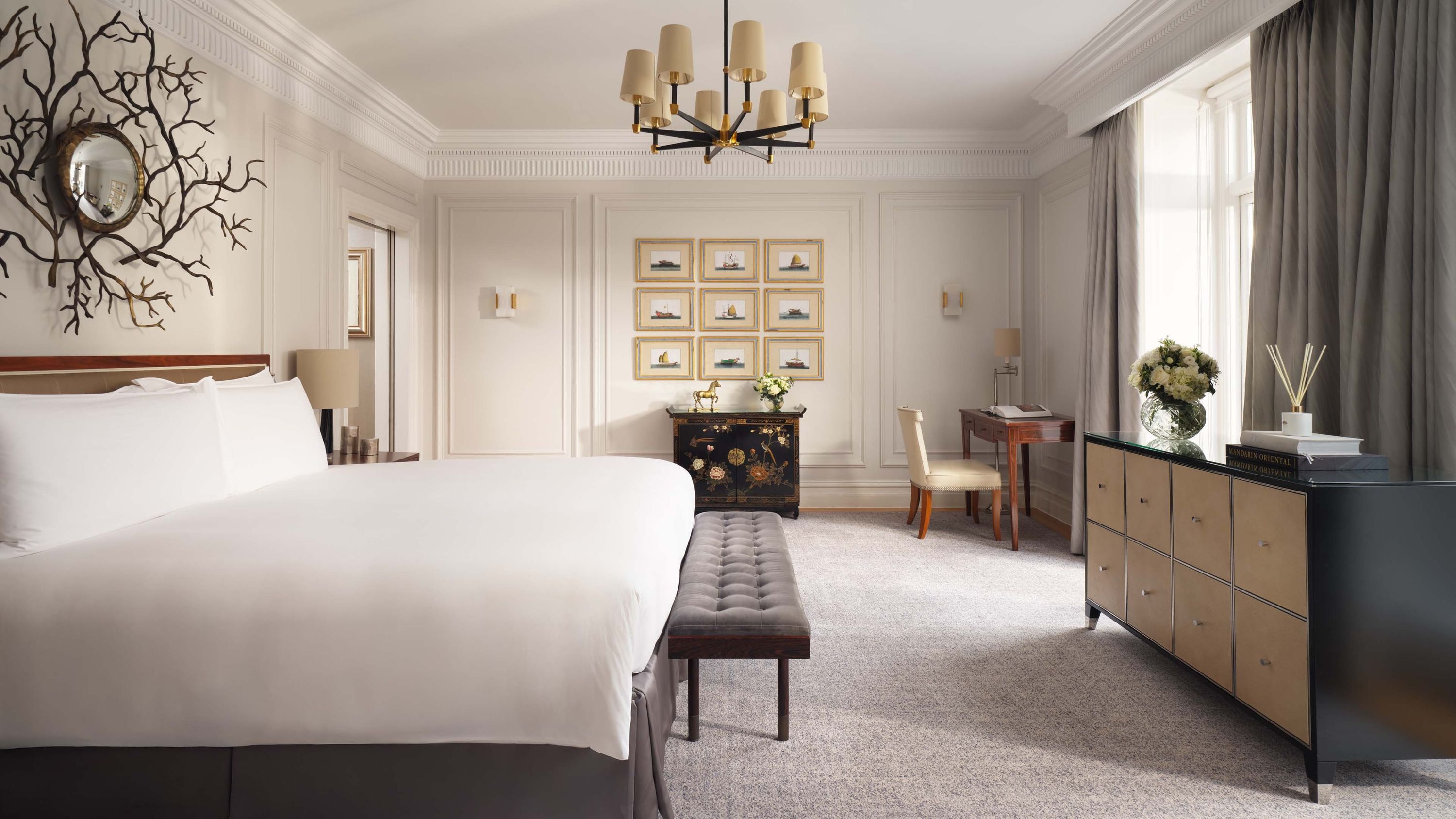 Bedroom with coral-branch mirror and marble fireplace