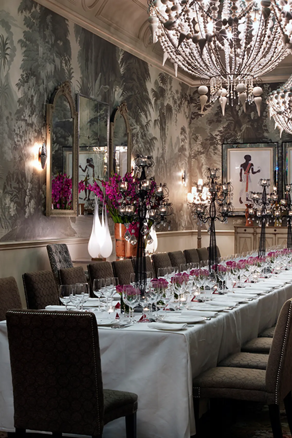 The Shooting Gallery, a long table against the de Gournay walls
