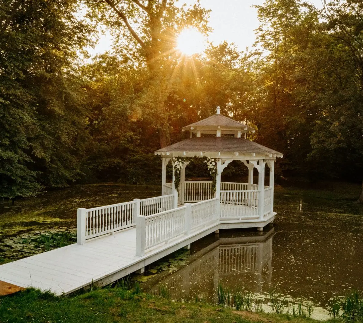 The Lake Pavilion and its white timber bridge at sunrise