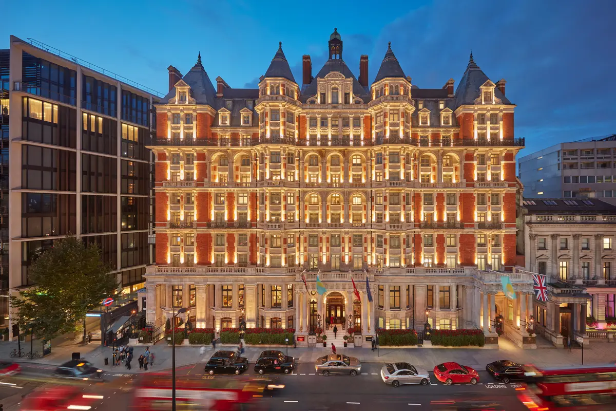 The landmark red-brick facade on Knightsbridge, floodlit at dusk, Mandarin Oriental Hyde Park, London, London, England