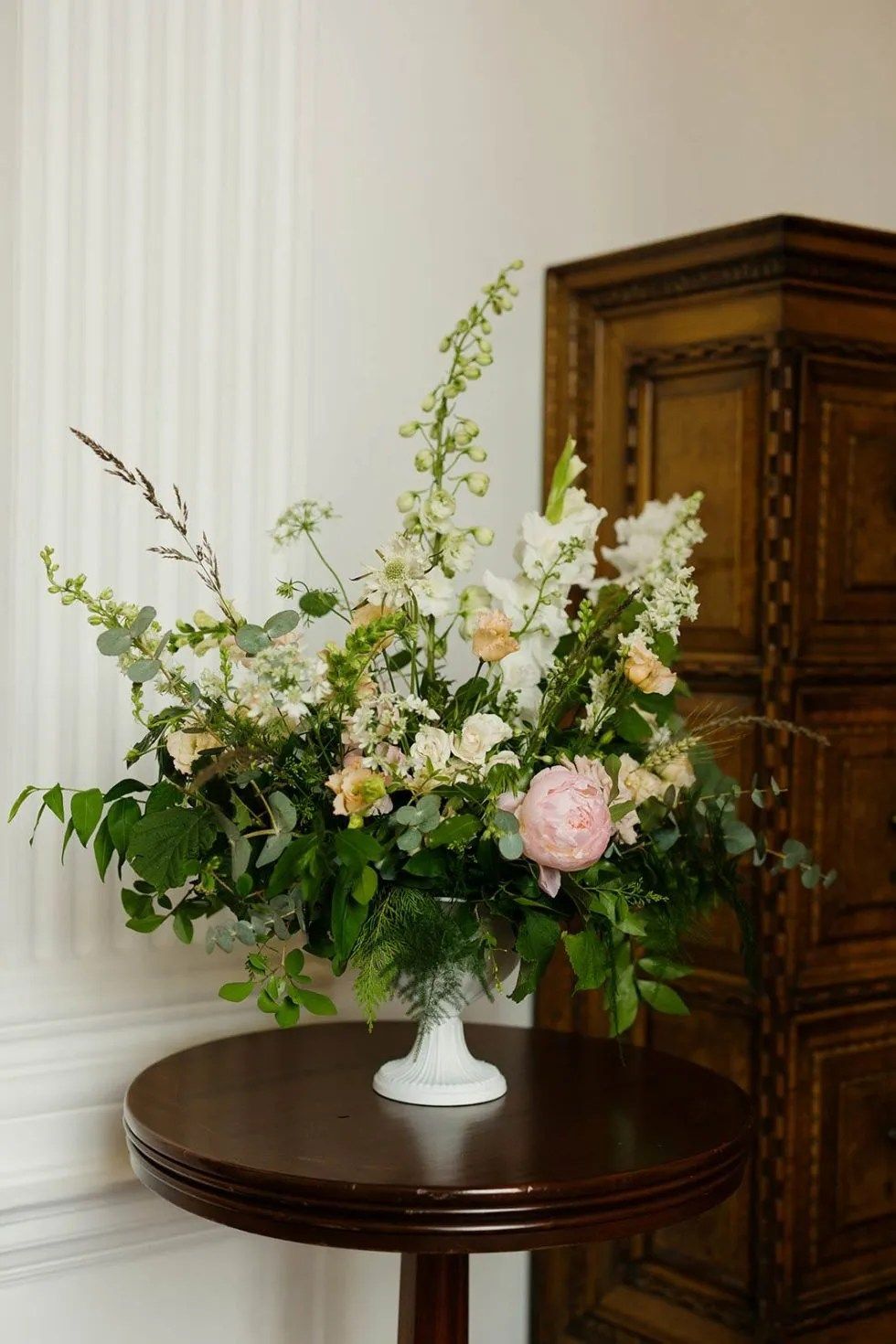 A low arrangement of white and blush flowers, The Ned